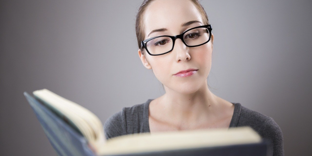 woman learning reading a book